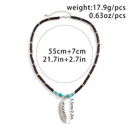 Exquisite and trendy mosaic wooden beads and turquoise with feather design pendant necklace