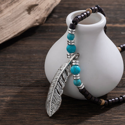 Exquisite and trendy mosaic wooden beads and turquoise with feather design pendant necklace