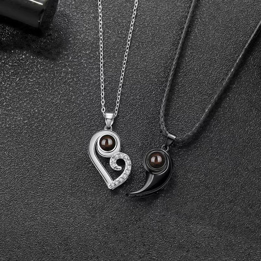 Trendy black and white matching heart design projection necklace